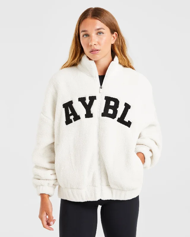 Varsity Oversized Fleece Zip Up Jacket - Cream Front Pockets Side Pockets Patch Pockets Varsity Oversized Fleece Zip Up Jacket - Cream Front Pockets Side Pockets Patch Pockets